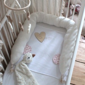 coussin réducteur de lit blanc